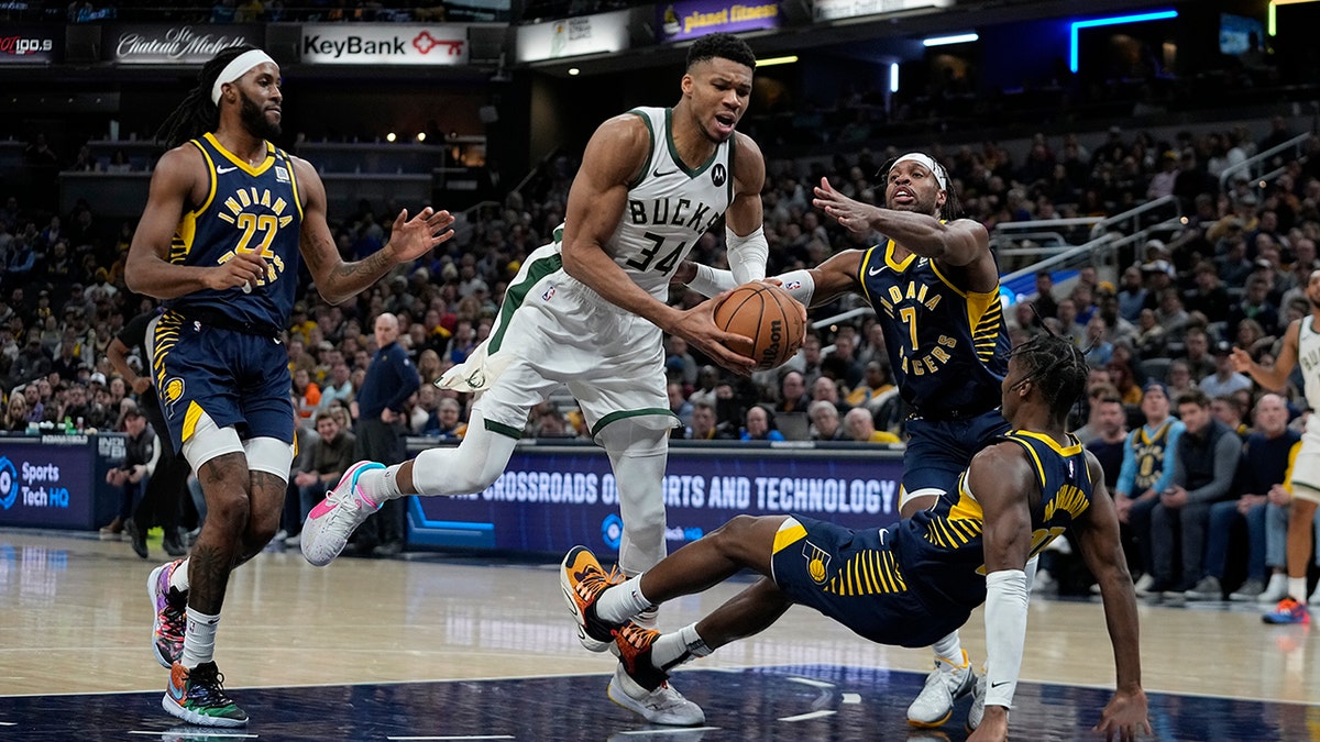 Giannis draws a foul