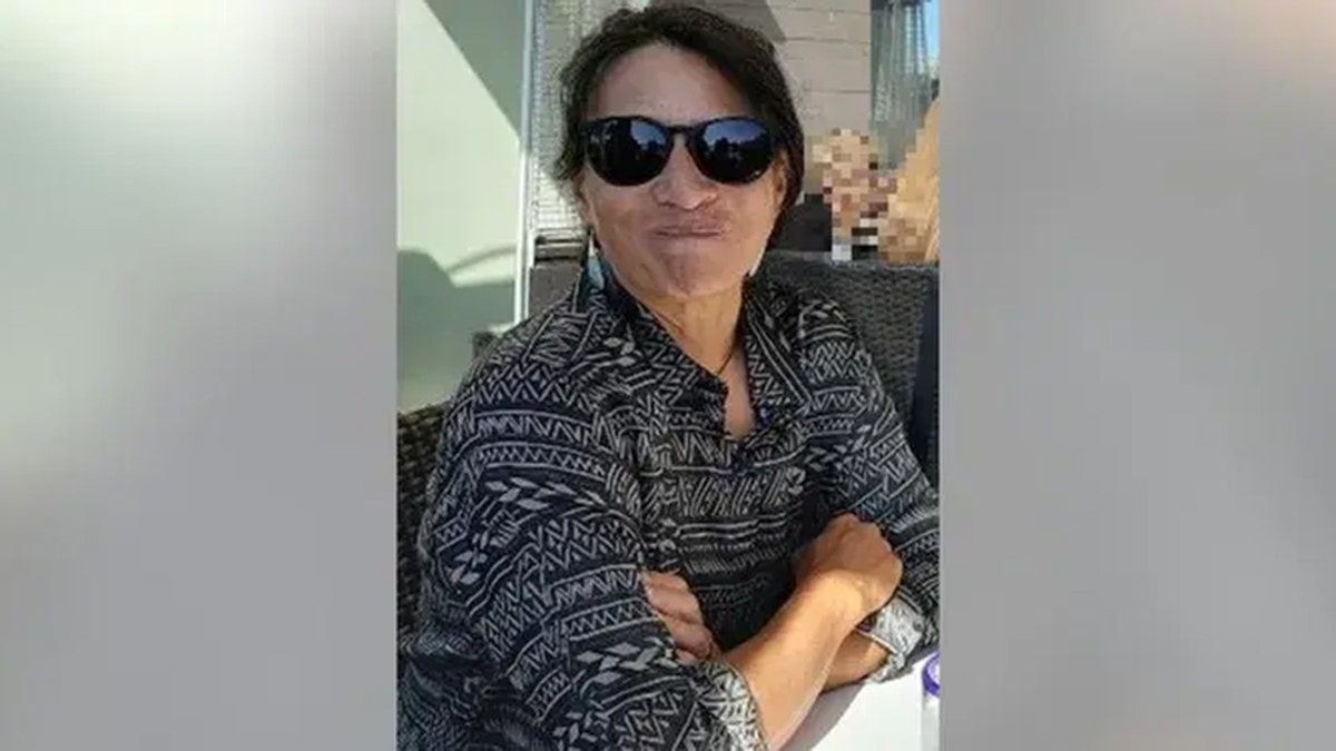 Alice "Alyx" Kamakaokalani Herrmann wearing sunglasses