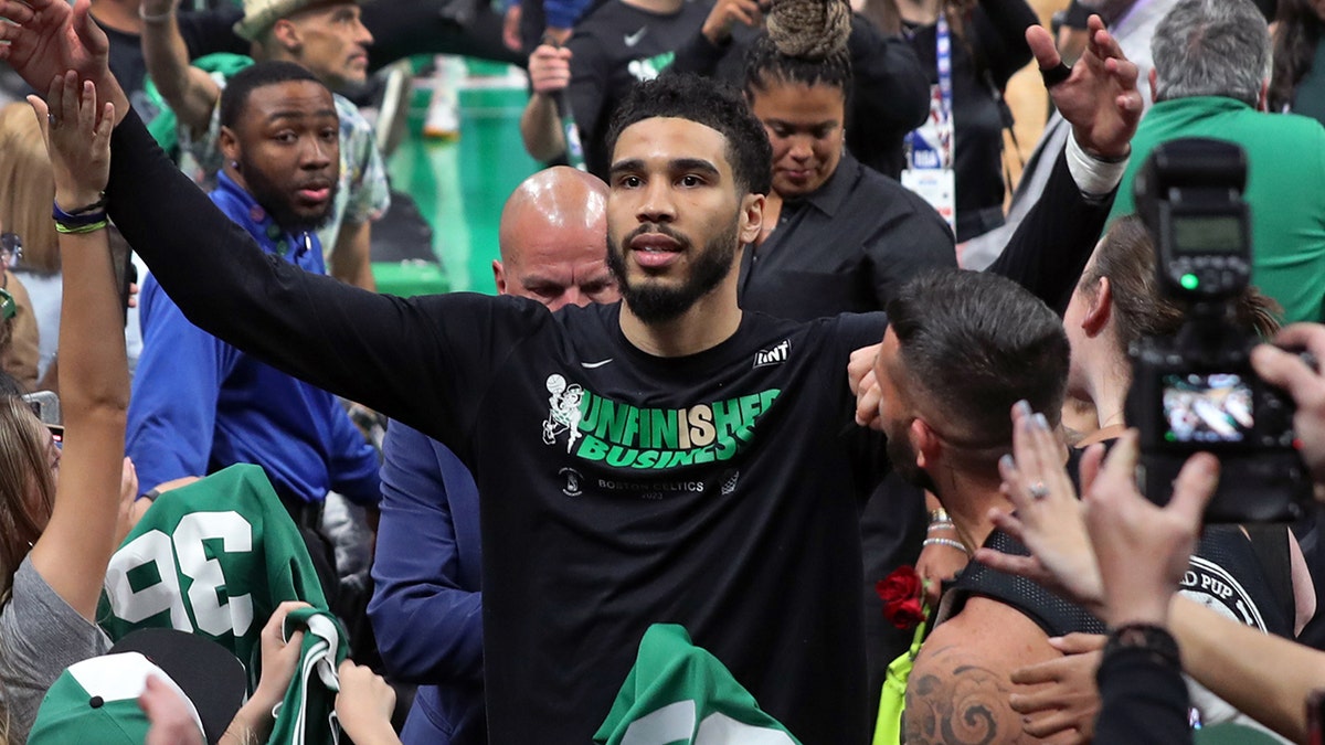 Jayson Tatum high five fans