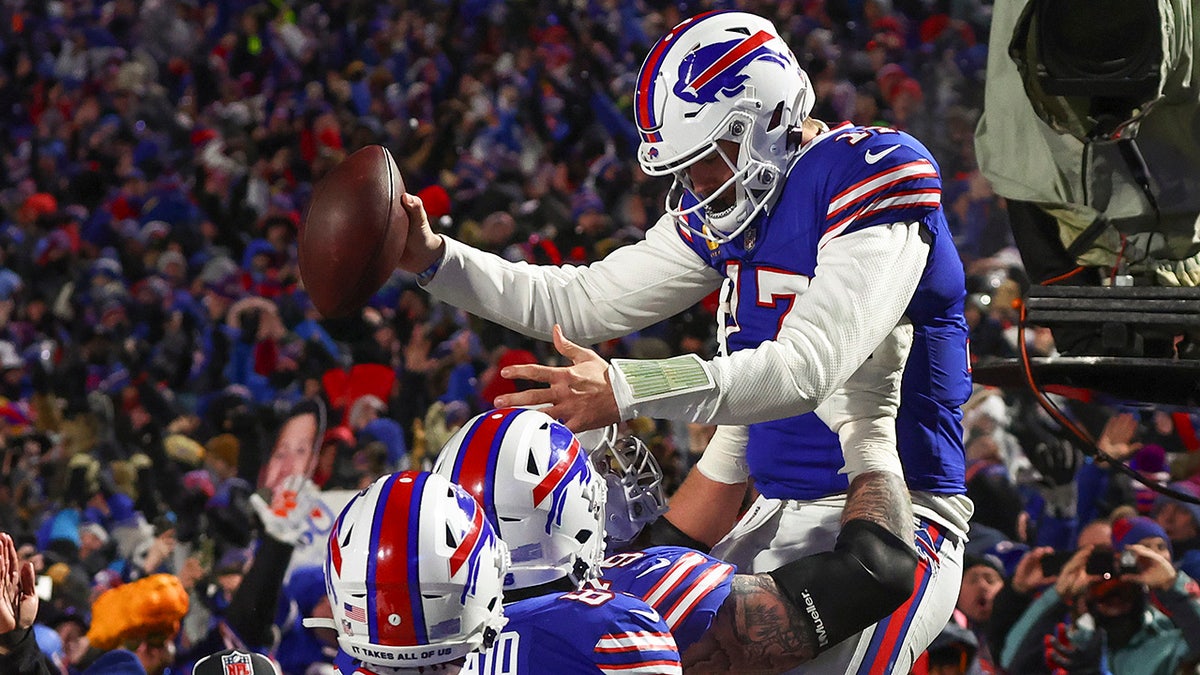 Bills players lift up Josh Allen