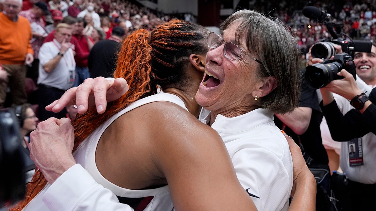 Tara VanDerveer and Kiki Iriafen