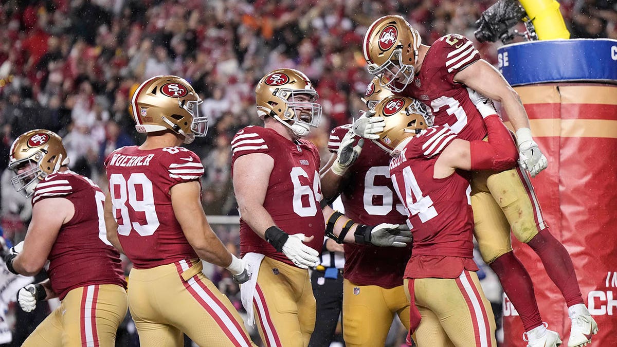 Niners celebrate CMC touchdown