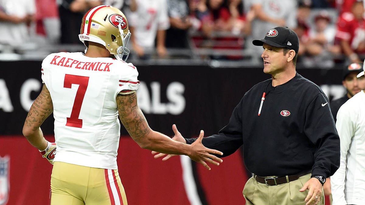 Kaepernick and Harbaugh shake hands 