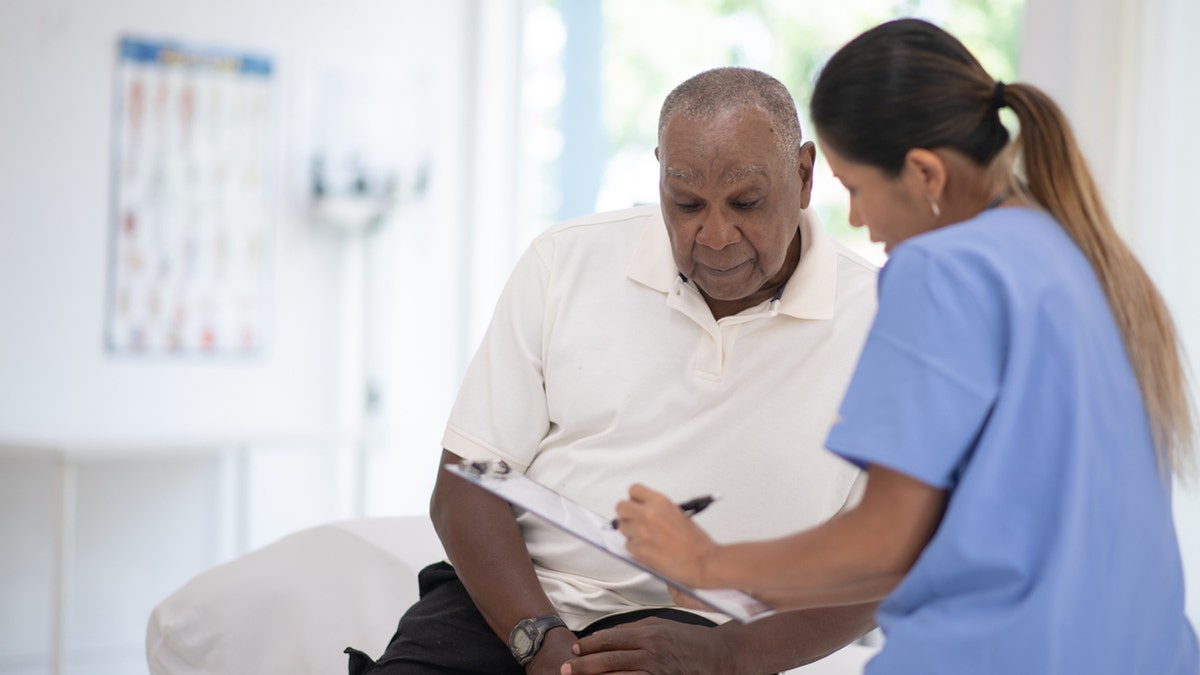 Man at doctor