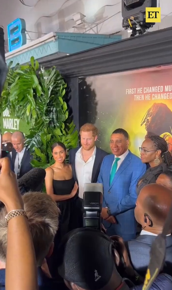 Meghan Markle and Prince Harry pose with the CEO of Paramount Pictures and Nickelodeon at the 'Bob Marley: One Love' premiere