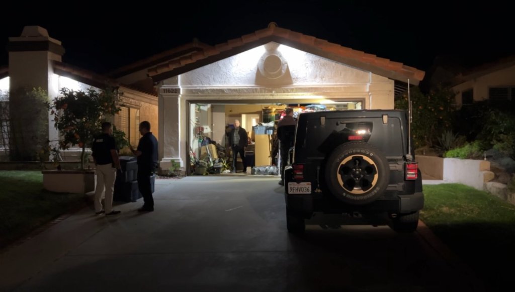 Authorities at the San Diego home where weapons were found