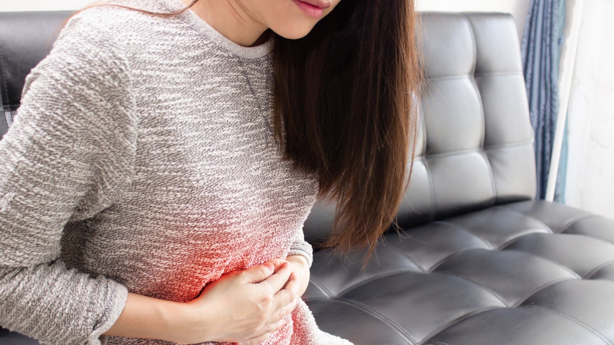 Woman stomach pain