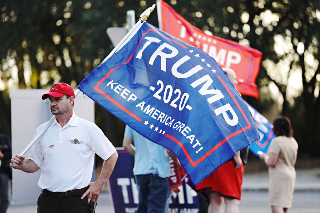 Trump supporters gather outside an event for republican presidential hopeful former Gov. Nikki Haley at the Embassy Suites in North Charleston, South Carolina.
