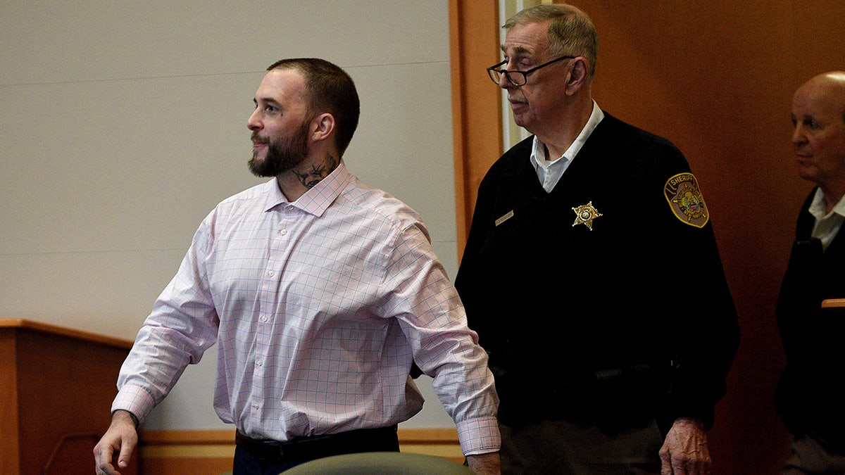 Adam Montgomery enters the courtroom for jury selection ahead of his murder trial