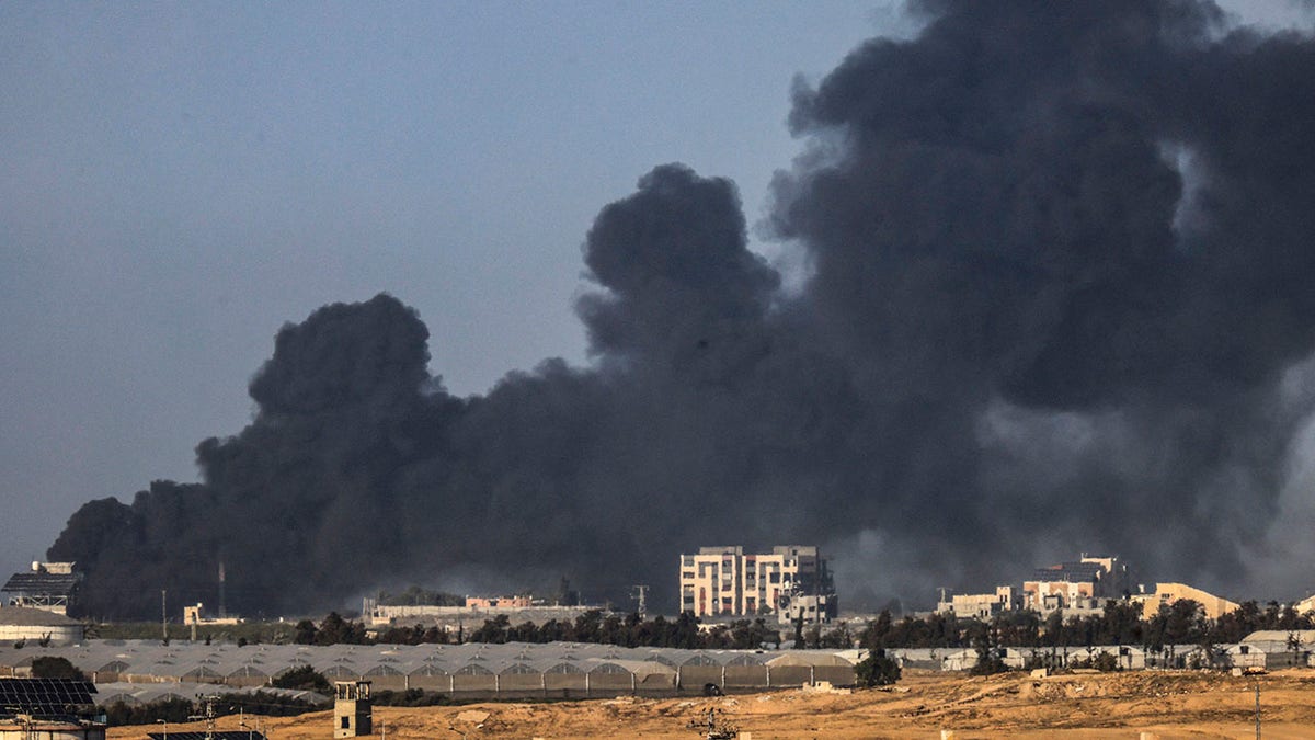 Black smoke over a city