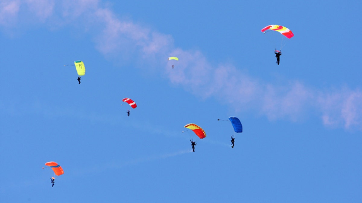 People skydiving