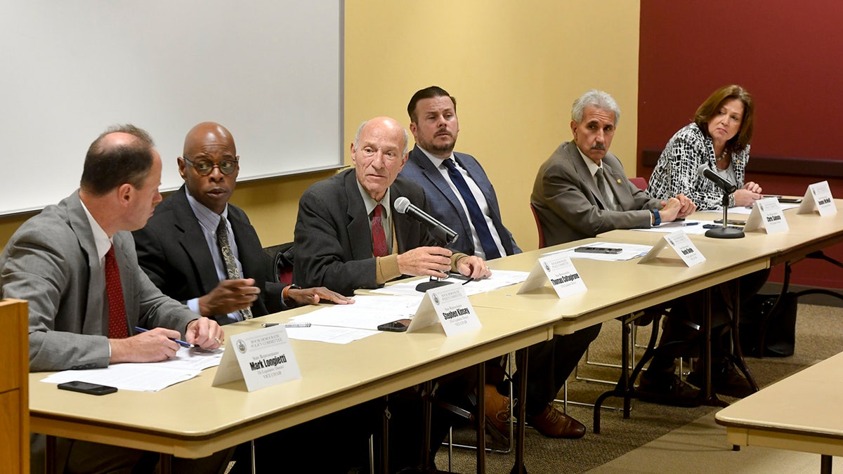 Kevin Boyle sits at a table with other Pennsylvania lawmakers during a hearing on affordable housing