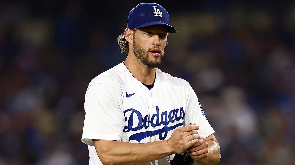 Clayton Kershaw pitches against the Cardinals