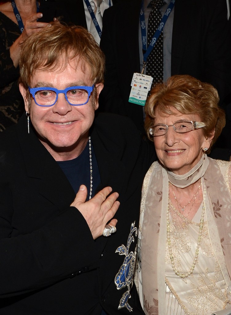LOS ANGELES, CA - FEBRUARY 08: Singer Sir Elton John and Adele Springsteen attend MusiCares Person Of The Year Honoring Bruce Springsteen at Los Angeles Convention Center on February 8, 2013 in Los Angeles, California.  (Photo by Larry Busacca/Getty Images for NARAS)