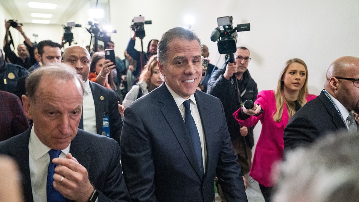 Hunter Biden smiles on Capitol Hill