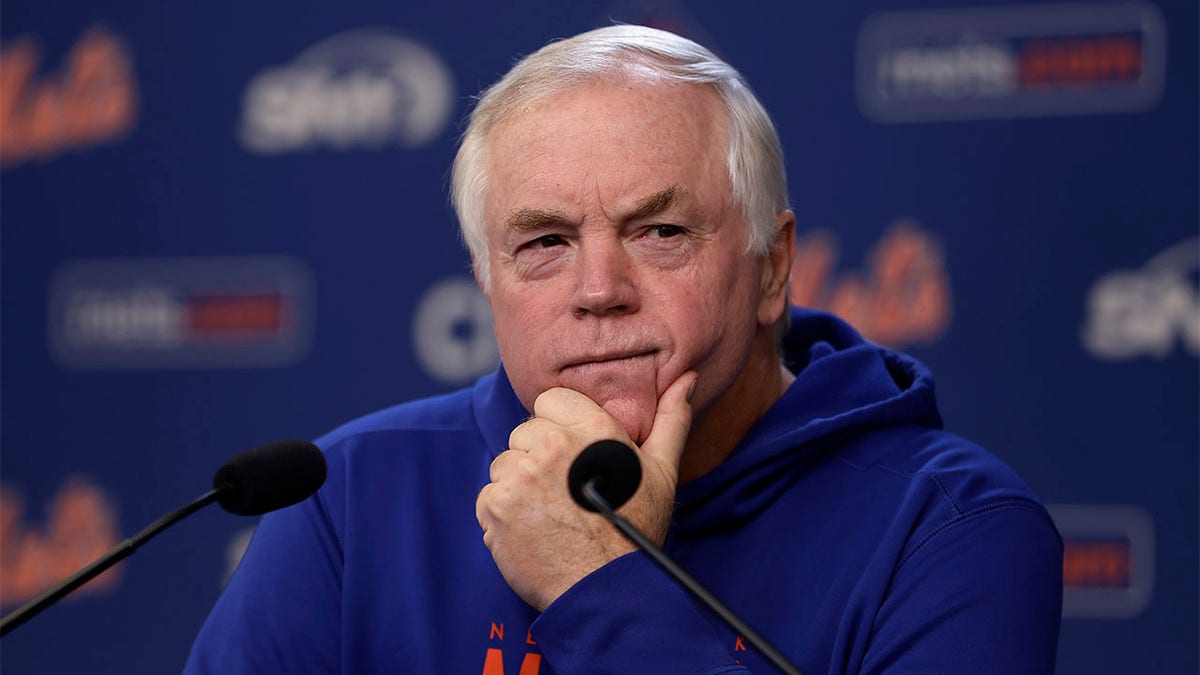 Buck Showalter speaks with the media