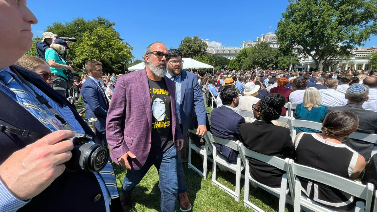 Manuel Oliver protester escorted out of Biden event