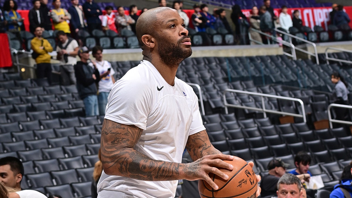 P.J. Tucker shoots during warmups