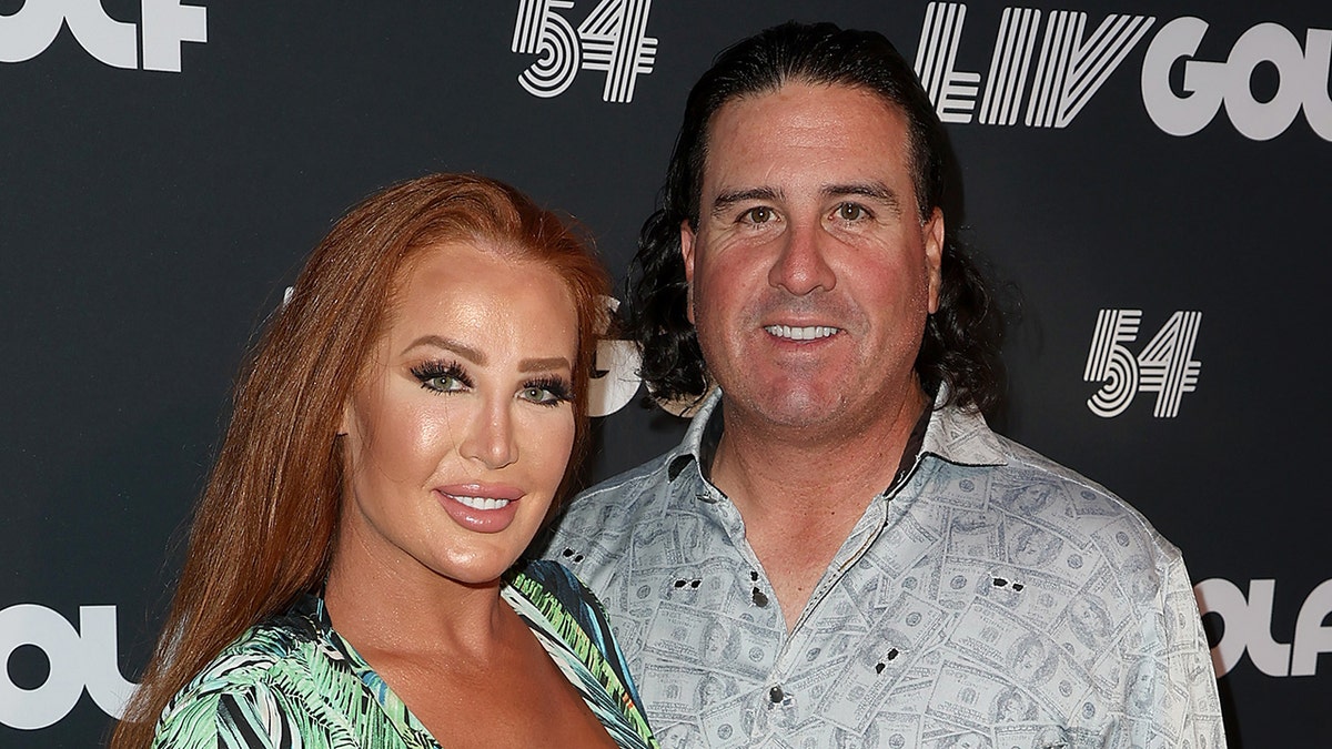 Pat Perez with his wife, Ashley, on red carpet