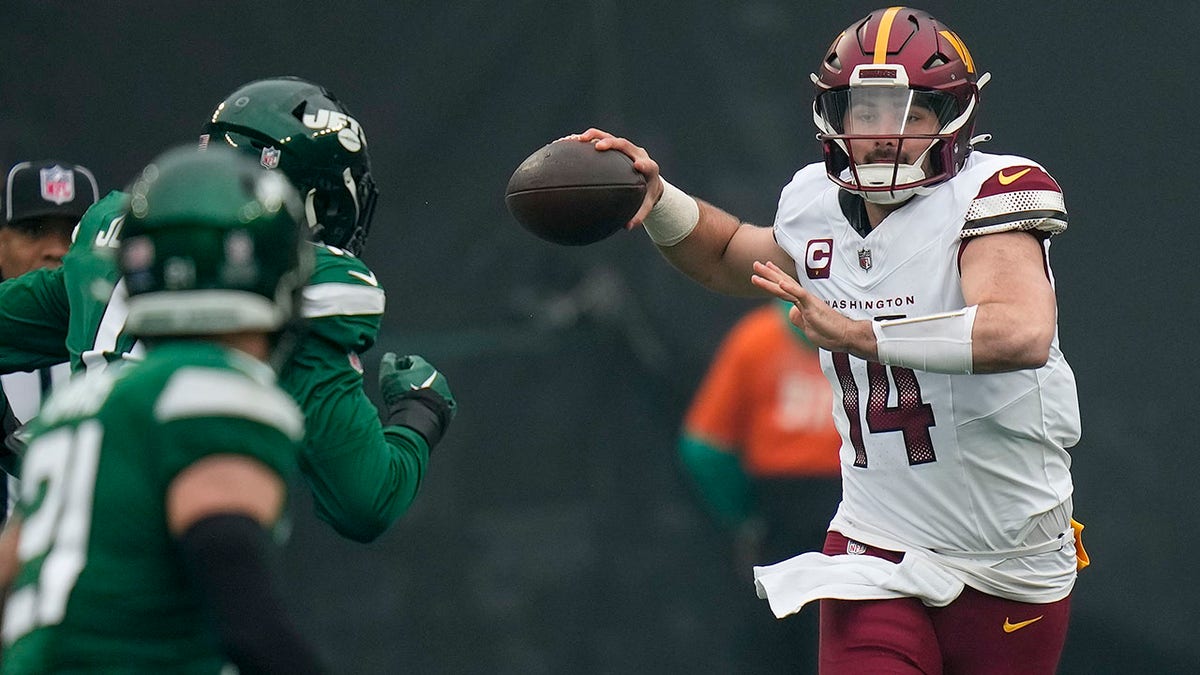 Sam Howell looks to throw