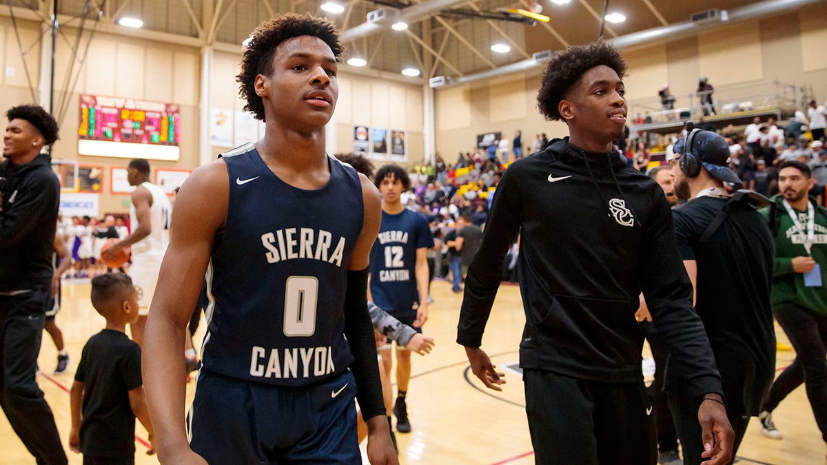 Zaire Wade and Bronny James during a basketball game