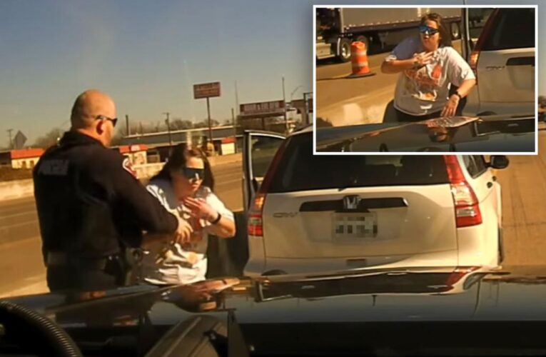 Texas cop performs Heimlich maneuver on motorist choking on piece of gum in the middle of highway: video