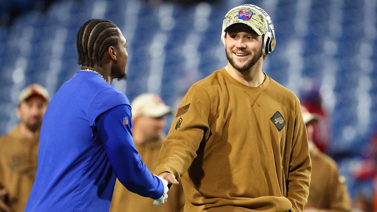 Stefon Diggs shakes Josh Allen's hand