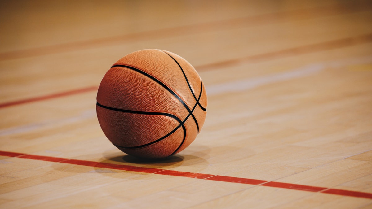 Basketball on empty court