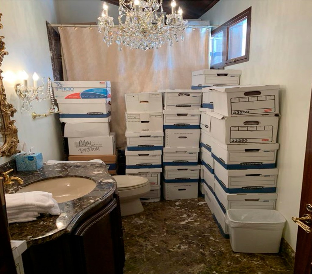 This image, contained in the indictment against former President Donald Trump, shows boxes of records stored in a bathroom and shower in the Lake Room at Trump's Mar-a-Lago estate in Palm Beach, Fla. 