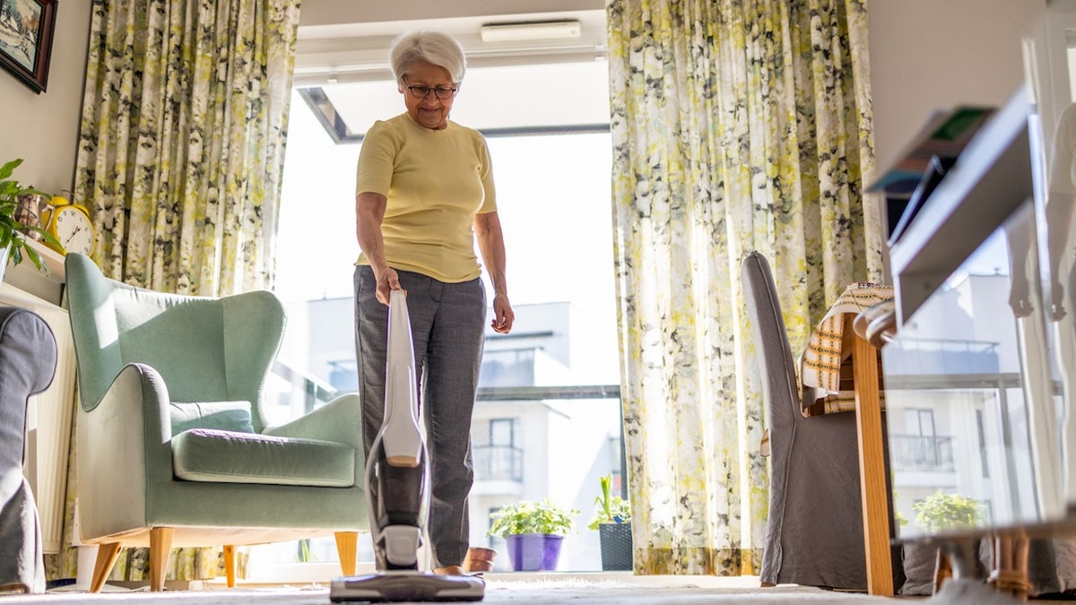 Woman vacuuming