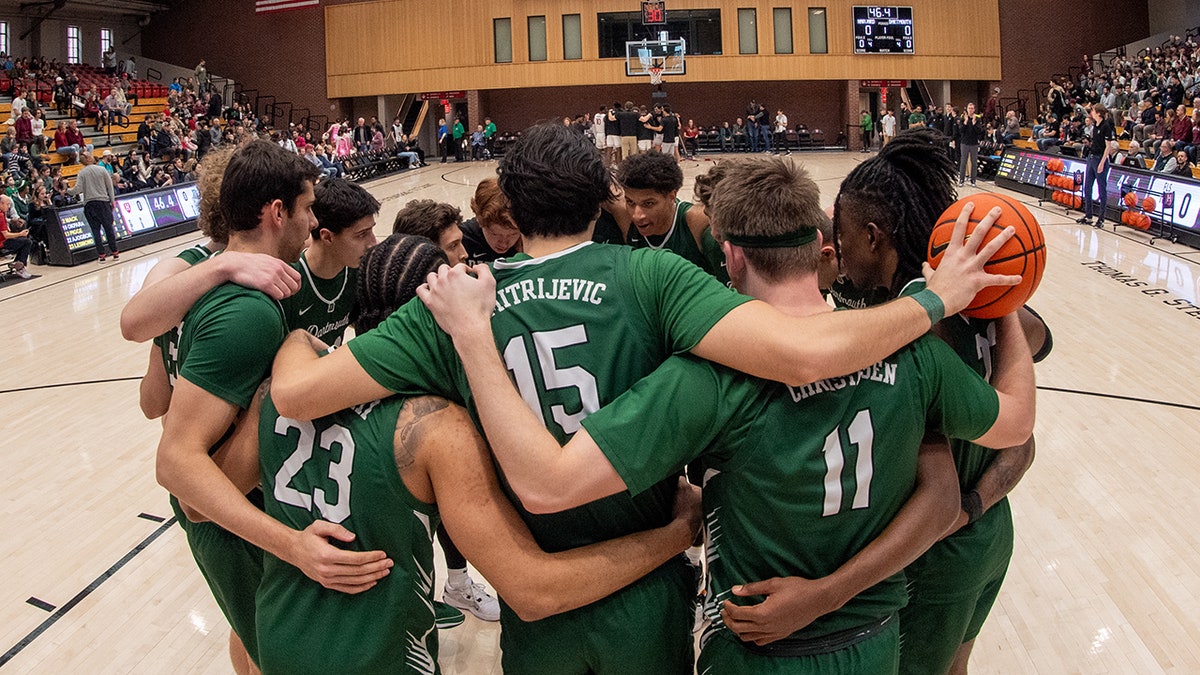 Dartmouth players huddle together