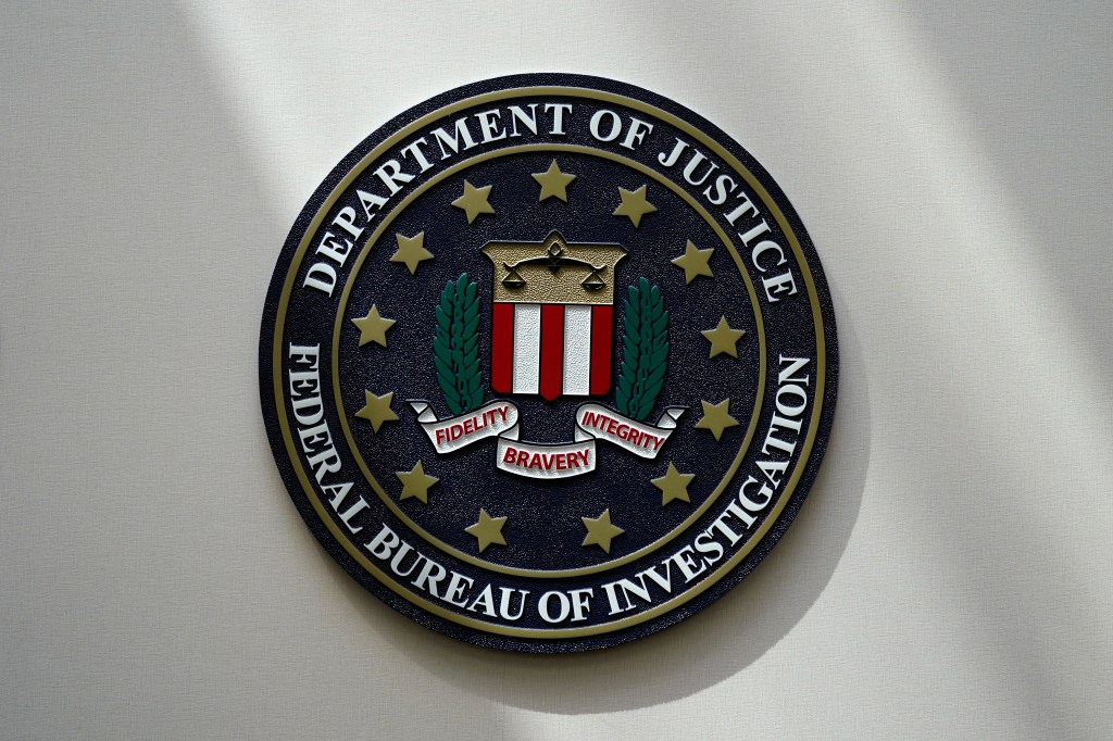 The FBI emblem on a wall.