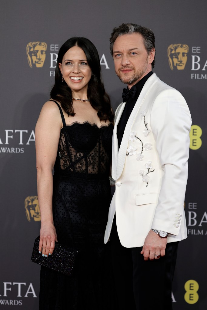 James McAvoy and Lisa Liberati posing for a picture at the 2024 EE BAFTA Film Awards in London.