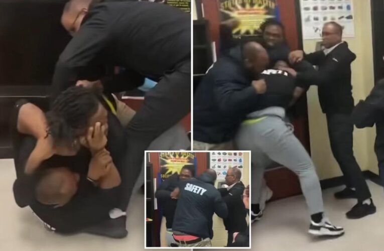 Teacher and security safety monitor brawl in school