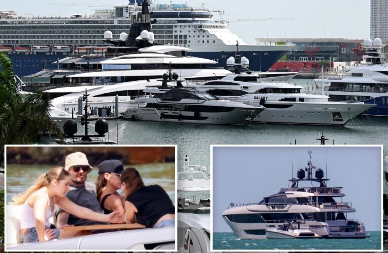 David, Victoria Beckham show off PDA near $20 million yacht in Miami: photos