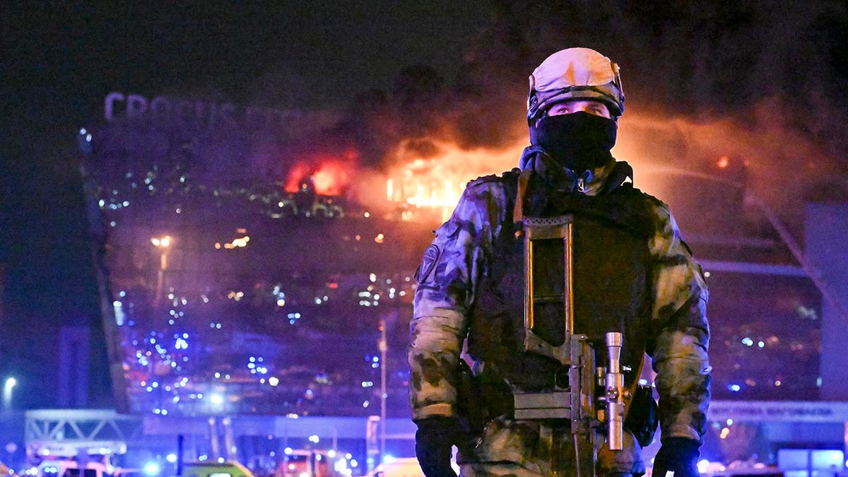 A fire fighter in front of the concert hall