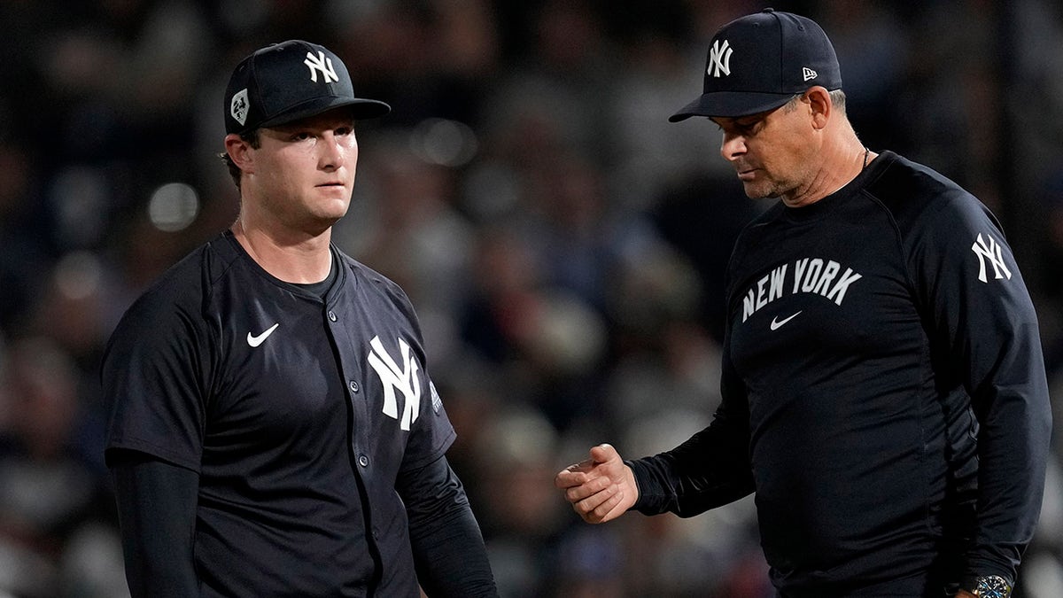 Gerrit Cole and Aaron Boone