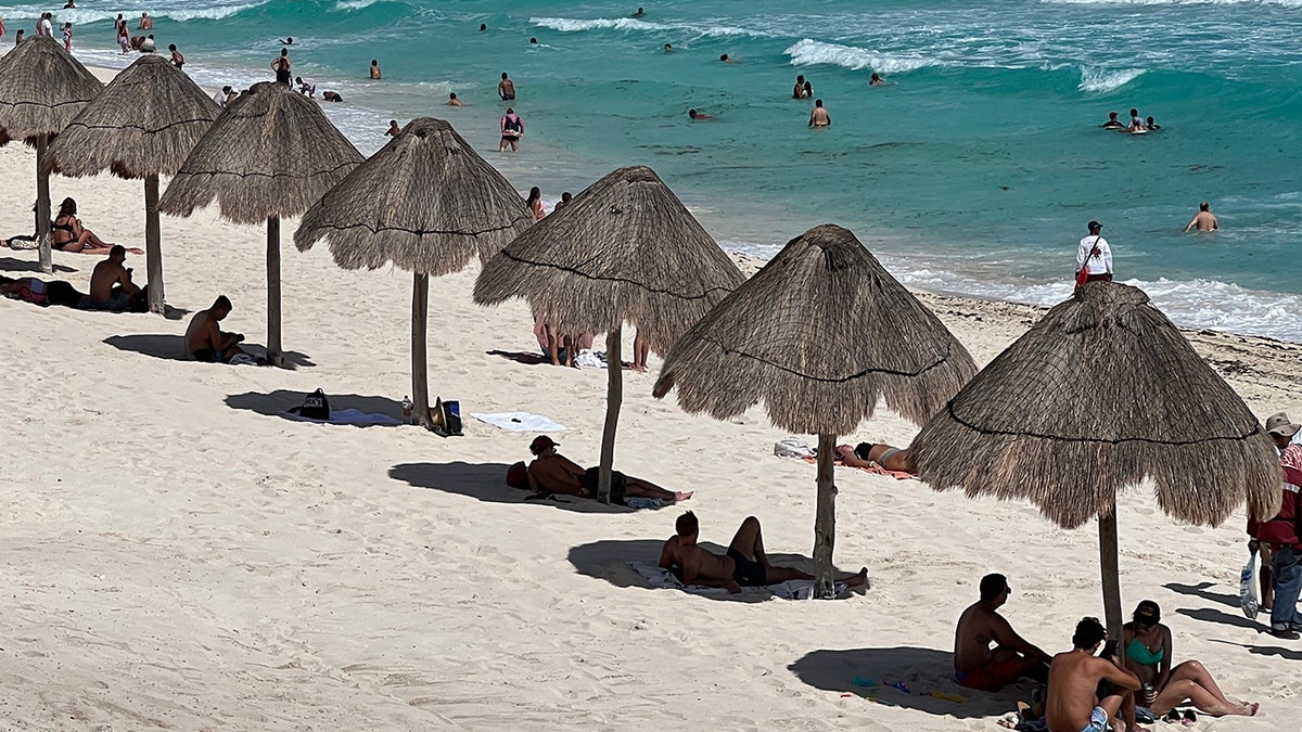 A photo of people at the beach