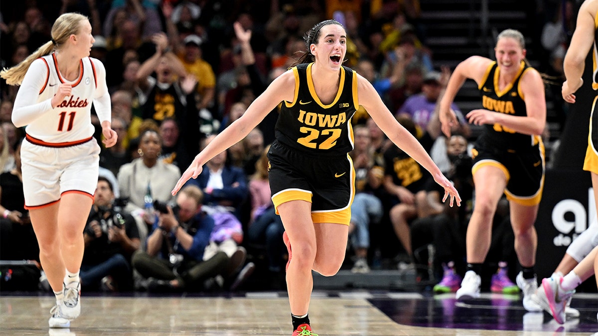 Caitlin Clark celebrates against Virginia Tech