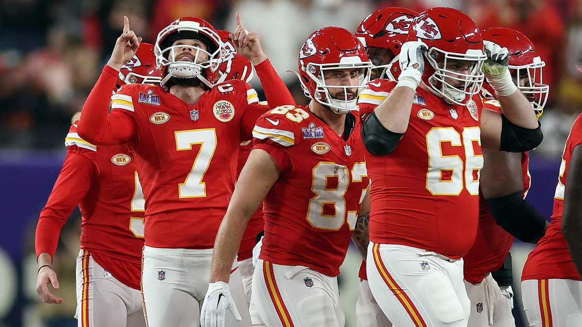 Harrison Butker points to the sky