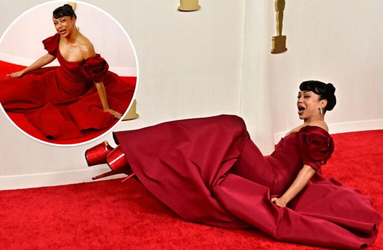 Liza Koshy takes brutal fall on Oscars 2024 red carpet