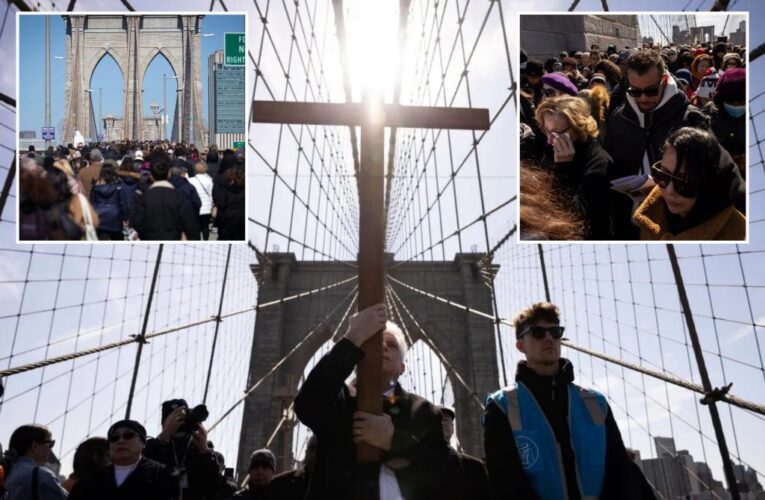 Thousands make silent journey across Brooklyn Bridge for ‘Way of the Cross’