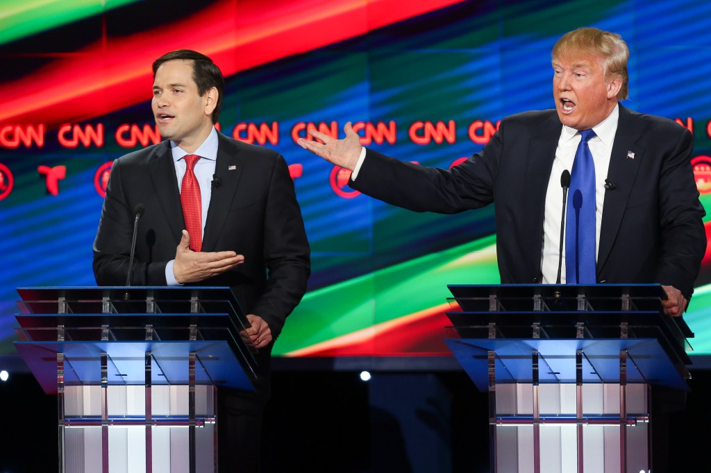 Republican presidential candidates, Sen. Marco Rubio, R-Fla, left, and businessman Donald Trump argue while answering a question during the Republican Presidential Primary Debate at the University of Houston Thursday, Feb. 25, 2016, Houston. 