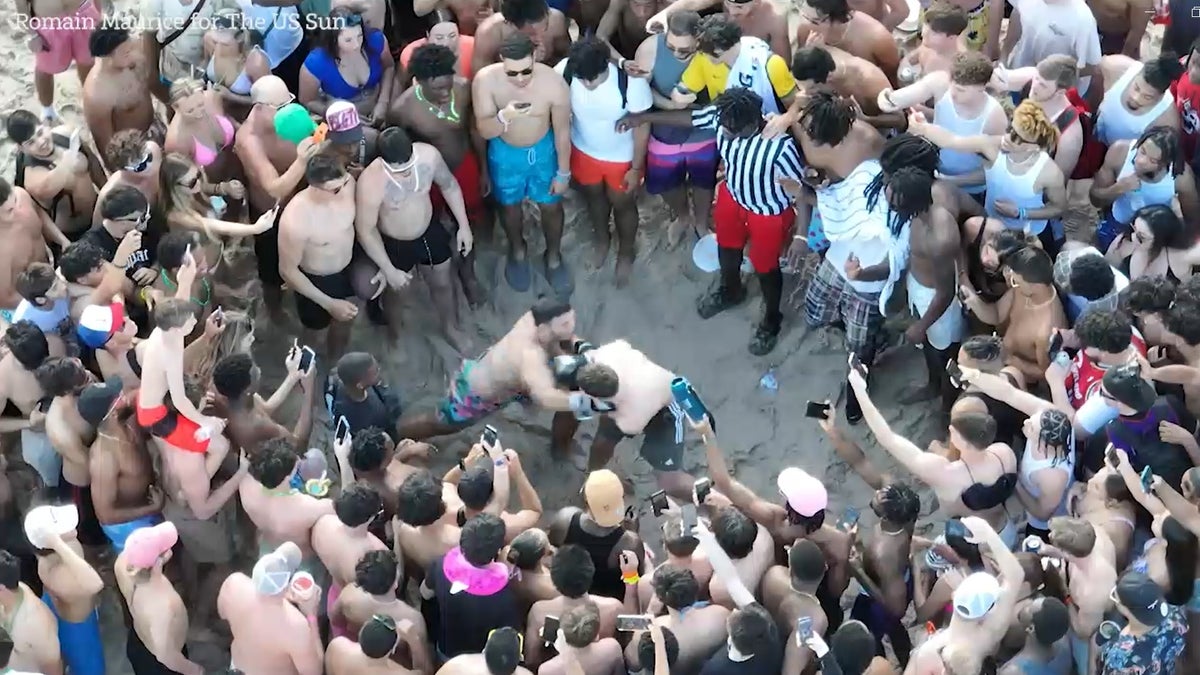 Beach boxing with a "ref" and cheering fans was part of spring break's first week of action.