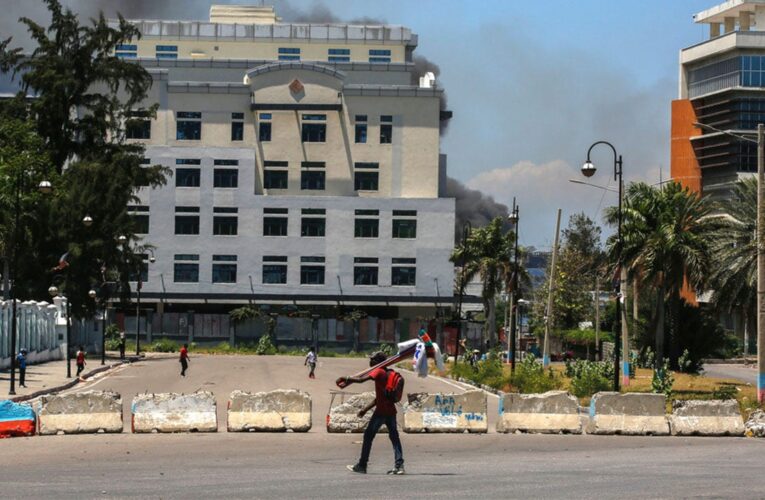 Haitian gangs loot national library amid spiraling violence that has forced thousands to flee capital city