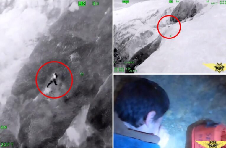 Moment man rescued by helicopter from cliffside after fall