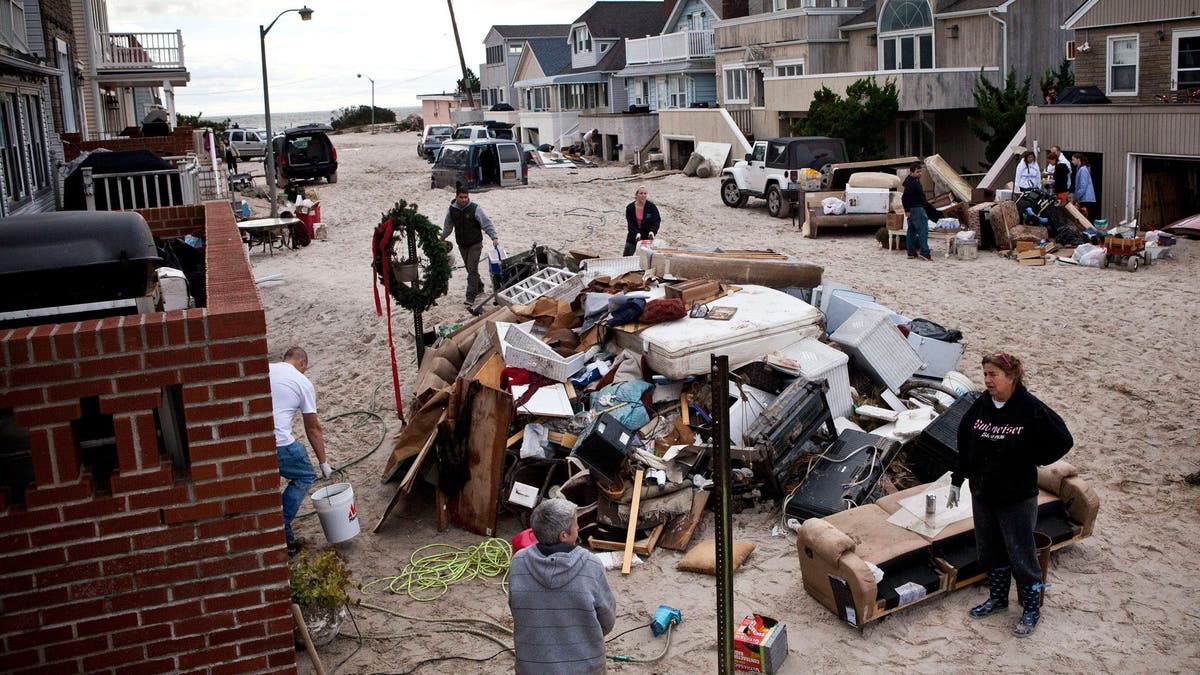 East Coast Begins To Clean Up And Assess Damage From Hurricane Sandy