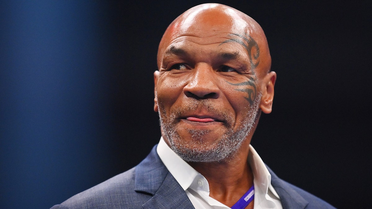 Mike Tyson looks out on stage