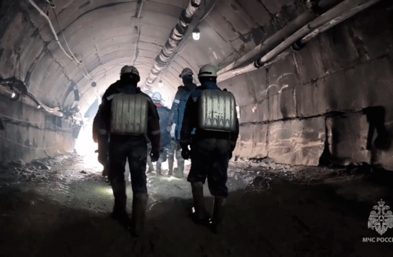 Russian crews end 2-week rescue effort to reach 13 miners in a collapsed mine and declare them dead