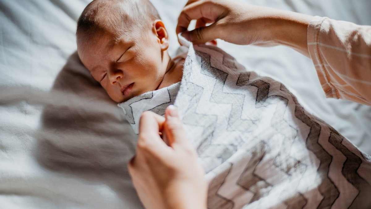 Swaddled baby sleeping